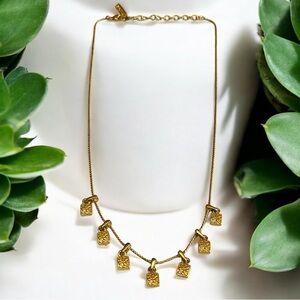 Napier Gold Tone Necklace with Decorative Floral Charms